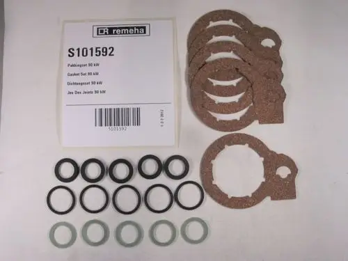 Gasket set von Remeha mit verschiedenen Dichtungen, darunter runde und ovale Gummidichtungen sowie Korkdichtungen, angeordnet auf hellem Hintergrund.